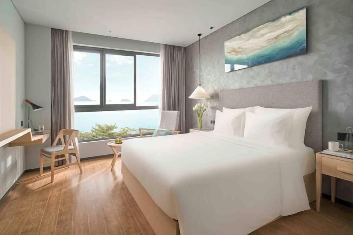 Premium bedding, memory foam beds, minibar, in-room safe