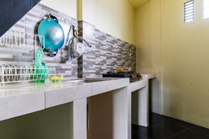 Shared kitchen facilities - KoolKost Syariah near Universitas Lambung Mangkurat (Banjarmasin)
