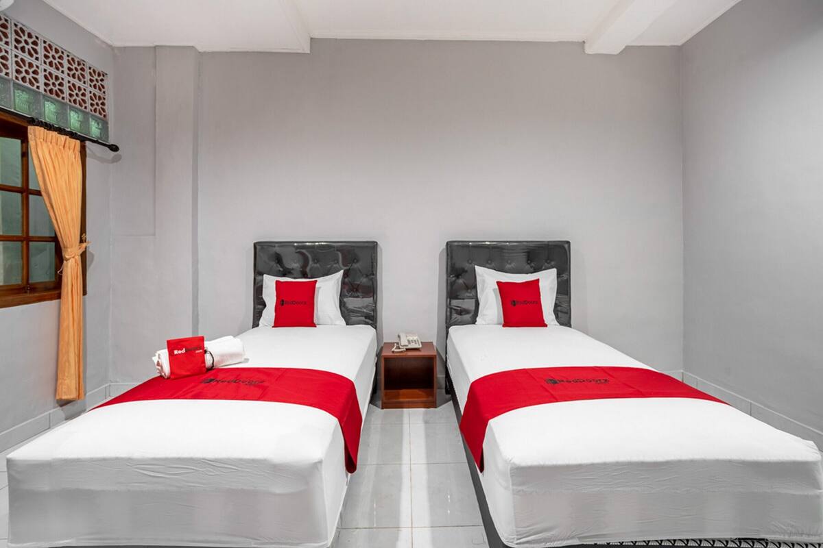Habitación estándar con 2 camas individuales | Ropa de cama