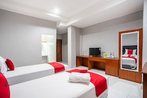 Habitación estándar con 2 camas individuales | Ropa de cama