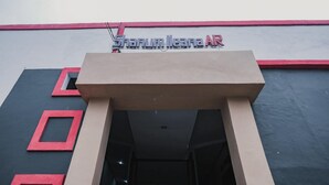 The entrance to a building with a sign reading "Shanum Teana AR". - RedDoorz near Jalan Soeprapto Bengkulu (Bengkulu)