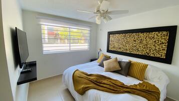 1 bedroom, laptop workspace, bed sheets