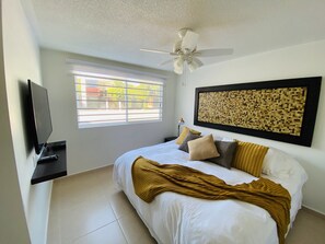 1 bedroom, laptop workspace, bed sheets