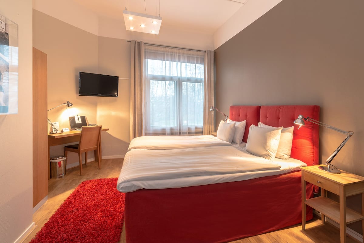 Habitación doble Confort | 1 habitación, minibar, decoración personalizada y muebles diferentes