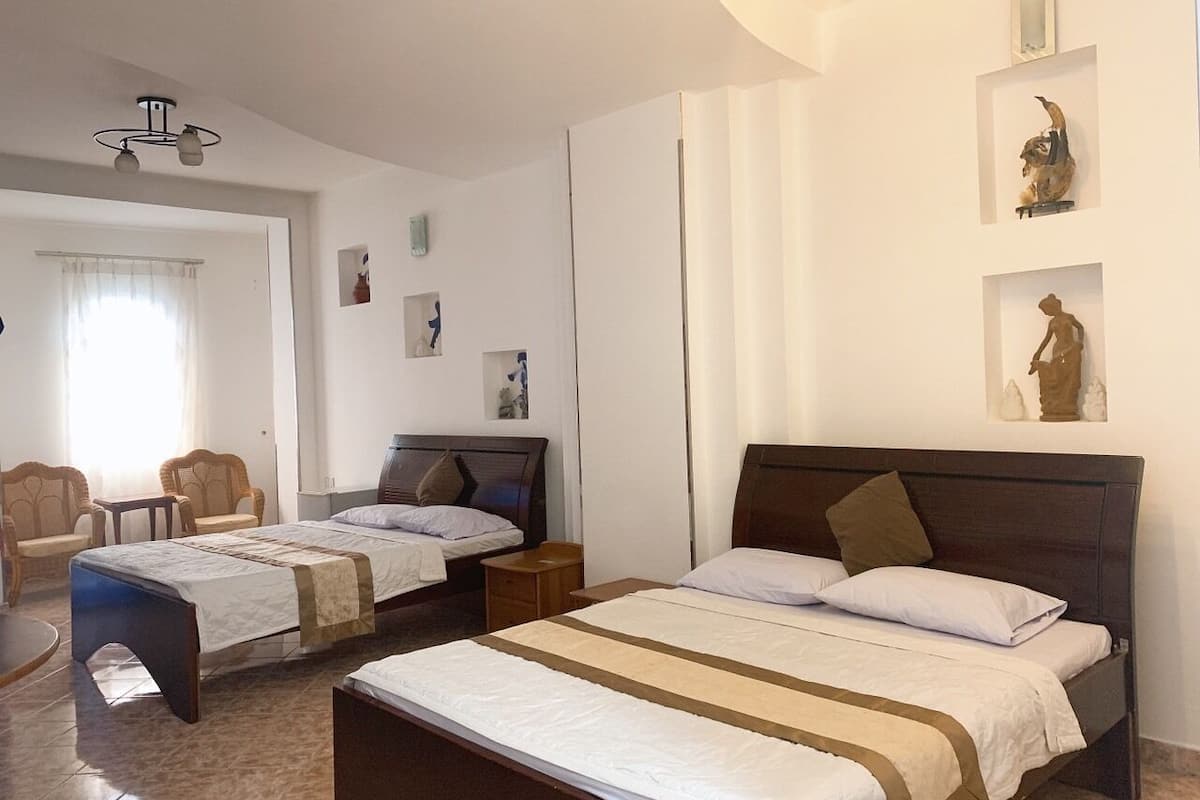 Quadruple Room | Minibar, desk, blackout drapes, iron/ironing board