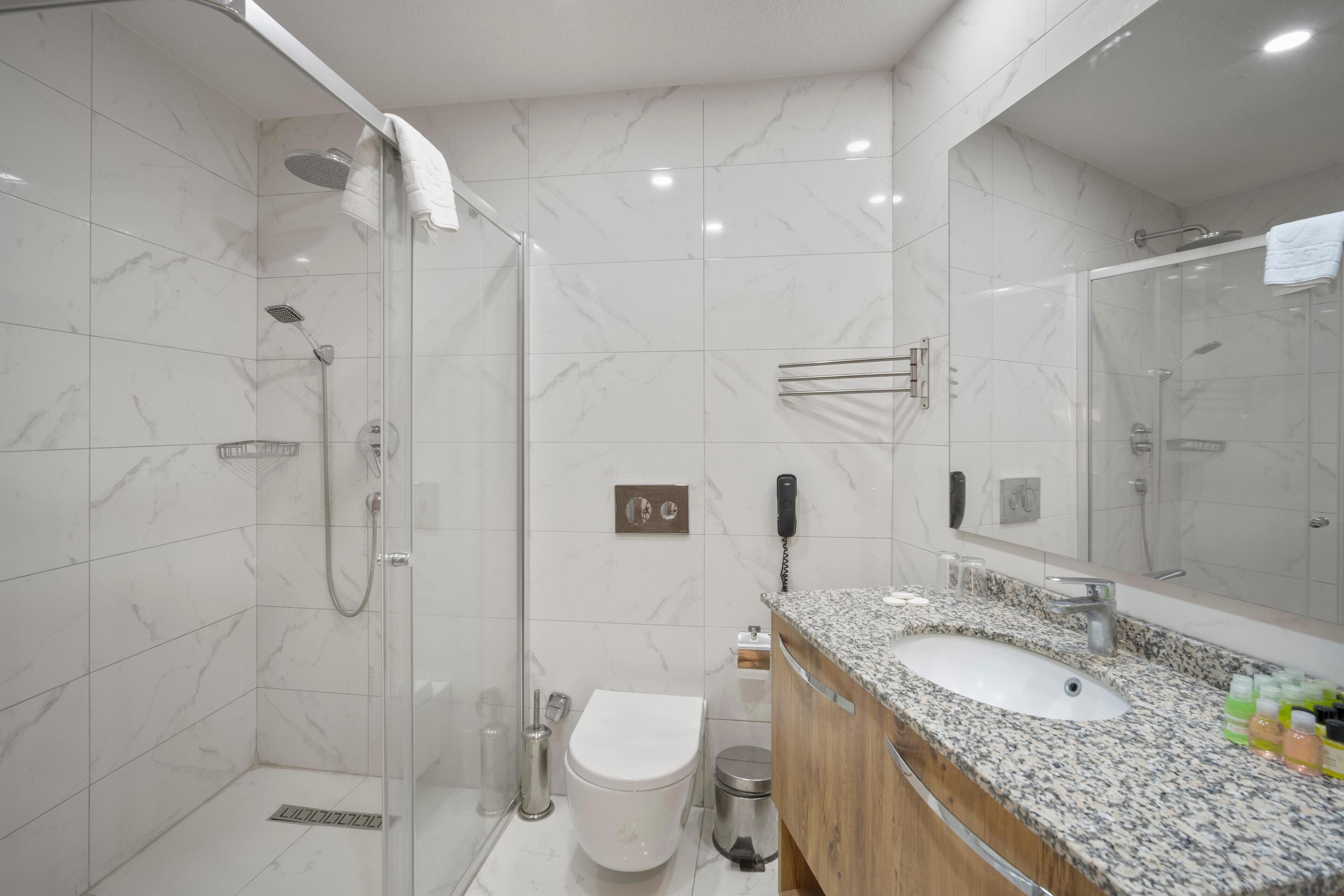 free toiletries, hair dryer, slippers, towels