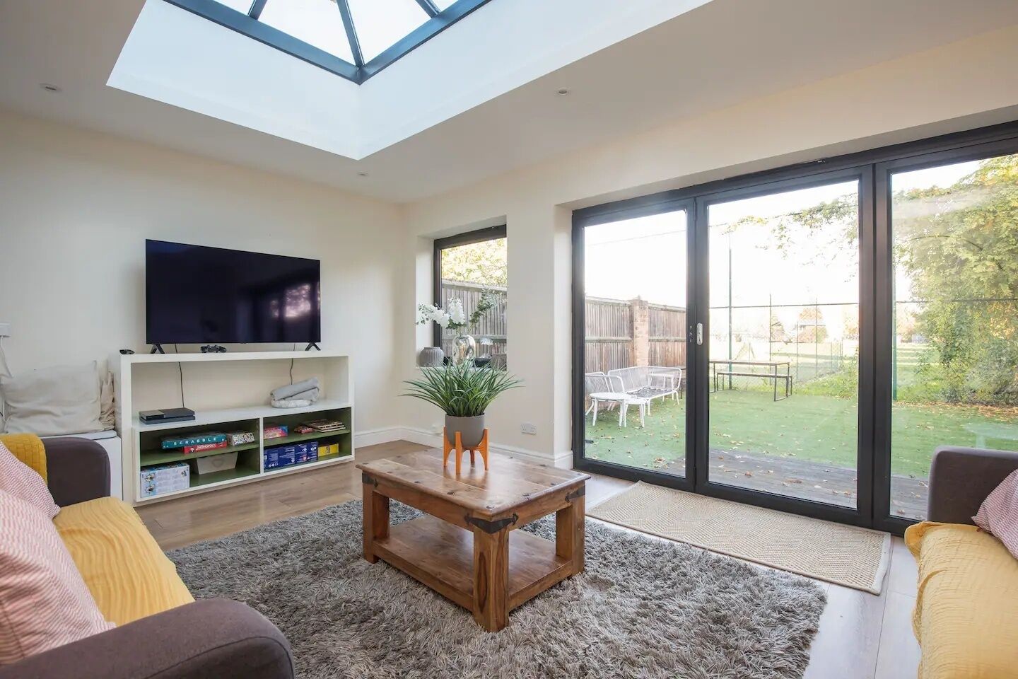 Flat-screen TV, video game console