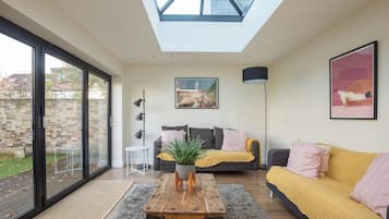 Flat-screen TV, video game console