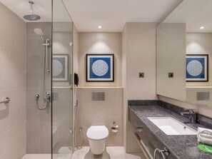 Designer toiletries, hair dryer, bathrobes, slippers