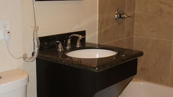 Executive Single Room | Bathroom | Hair dryer, towels, soap, shampoo