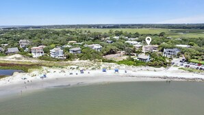 A coastal residential area with houses, a beach, and a body of water. - Magnificent Ocean Views, Private Heated Pool, Billards on East Beach! (Saint Simons Island)