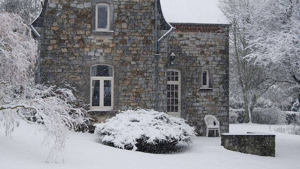 A stone building with multiple windows and a snow-covered landscape. - Stone-built Holiday Home in Dinant With Terrace (Dinant)