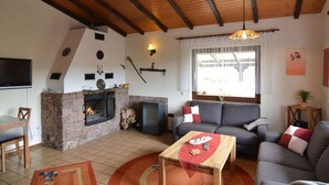 House | Living room | Fireplace, DVD player - Attractive Holiday Home in Frielendorf With Fenced Garden (Frielendorf)