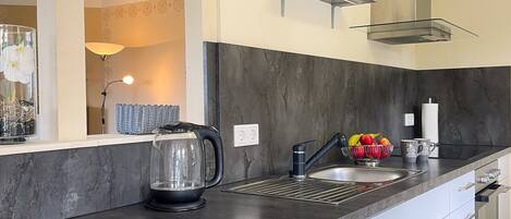 Apartment | Private kitchen | Stovetop, dishwasher, highchair