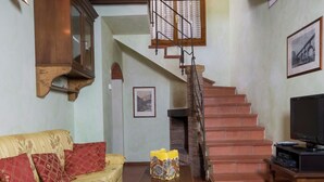 House | Living room | Fireplace - Wine, Good Food, Nature, Art, Swimming Pool and Tennis Court (Montaione)