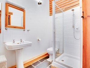 Kombinasi shower/bathtub dan handuk