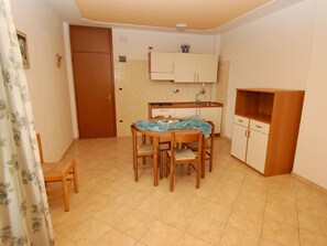 Apartment | Private kitchen - Sun Drenched Seaside Holiday Home near Venice (Rosolina)