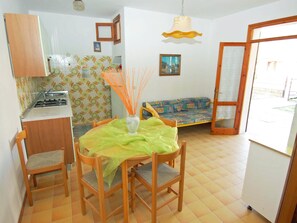 Apartment | Private kitchen - Sun Drenched Seaside Holiday Home near Venice (Rosolina)