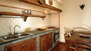 House | Private kitchen | Fridge, oven, highchair - Holiday Home in Collesano With Pool (Collesano)