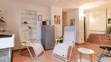 Apartment | Private kitchen | Fridge, high chair