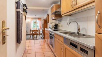 Apartment | Private kitchen | Fridge, high chair