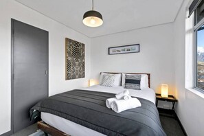 2 bedrooms, desk, iron/ironing board, travel crib