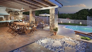 An outdoor patio with a pool, stone pillars, and a wooden pergola. - Attractive Villa With Private Swimming Pool, Beach Volleyball and Fenced Garden (Rasa)