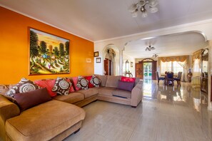 47-inch TV with cable channels, fireplace