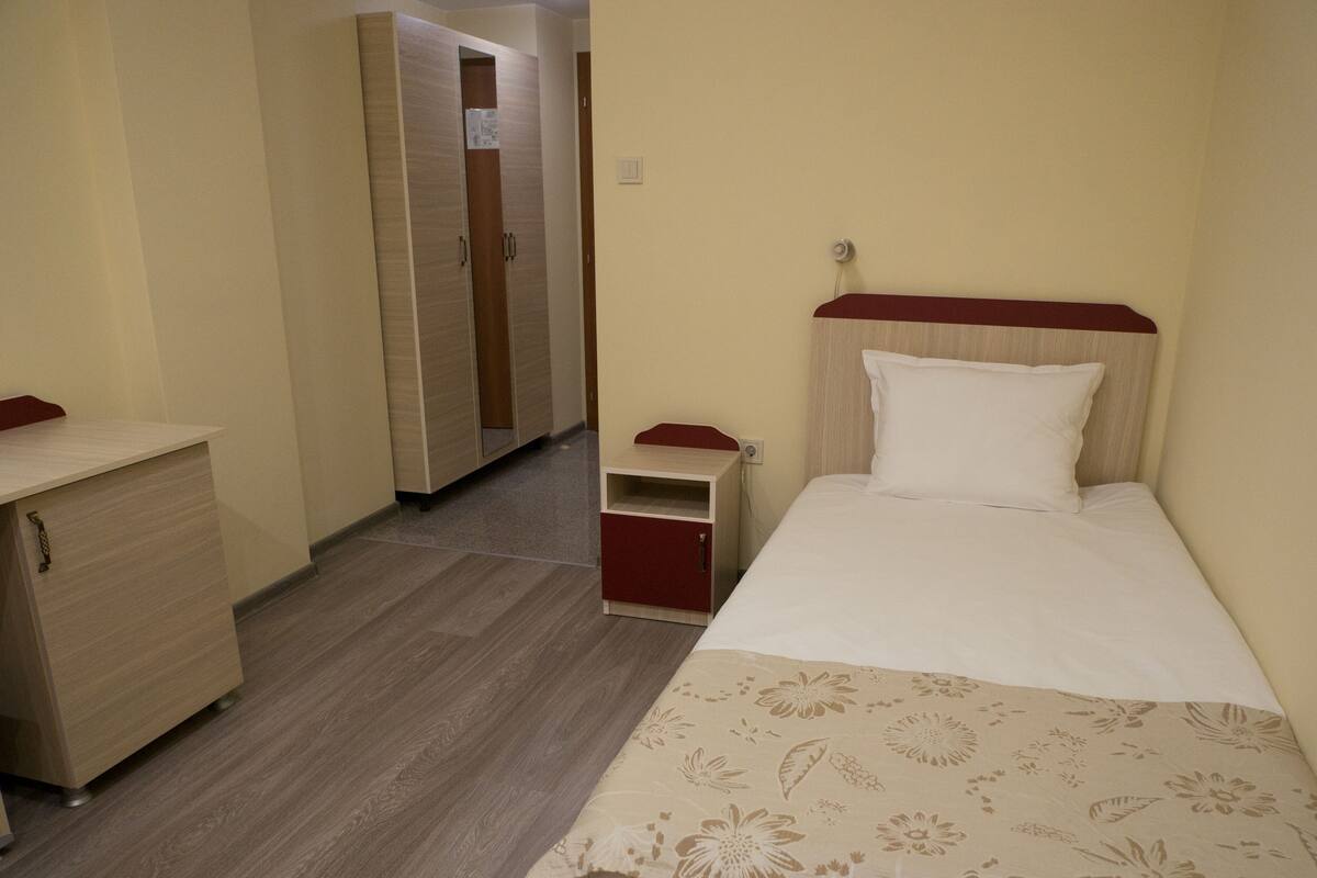 classic single room | desk, laptop workspace, blackout curtains, soundproofing