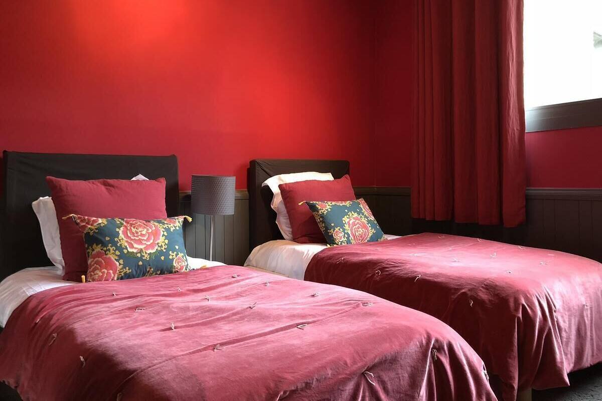 Suite, 2 Bedrooms | Desk, blackout curtains, soundproofing, iron/ironing board (on request)