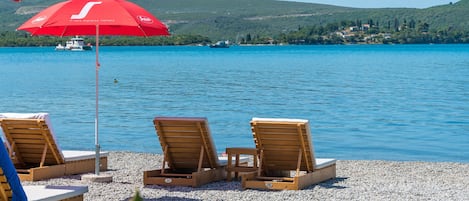 Private beach, sun loungers, beach umbrellas, beach towels