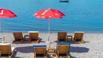 Private beach, sun-loungers, beach umbrellas, beach towels