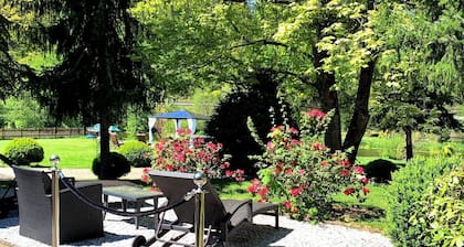 Vacation apartment on the ground floor with large garden and access to the Waldnaab