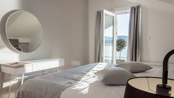 28 dormitorios, escritorio, tabla de planchar con plancha