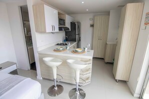 Apartment, Balcony, City View (Deluxe Balcony II) | Private kitchen | Full-size fridge, microwave, oven, stovetop