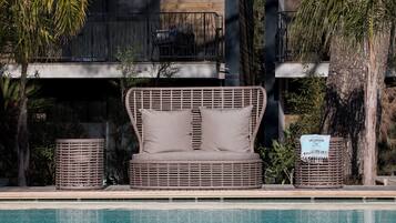 Outdoor pool, open 8:00 AM to 8:00 PM, pool umbrellas, sun loungers