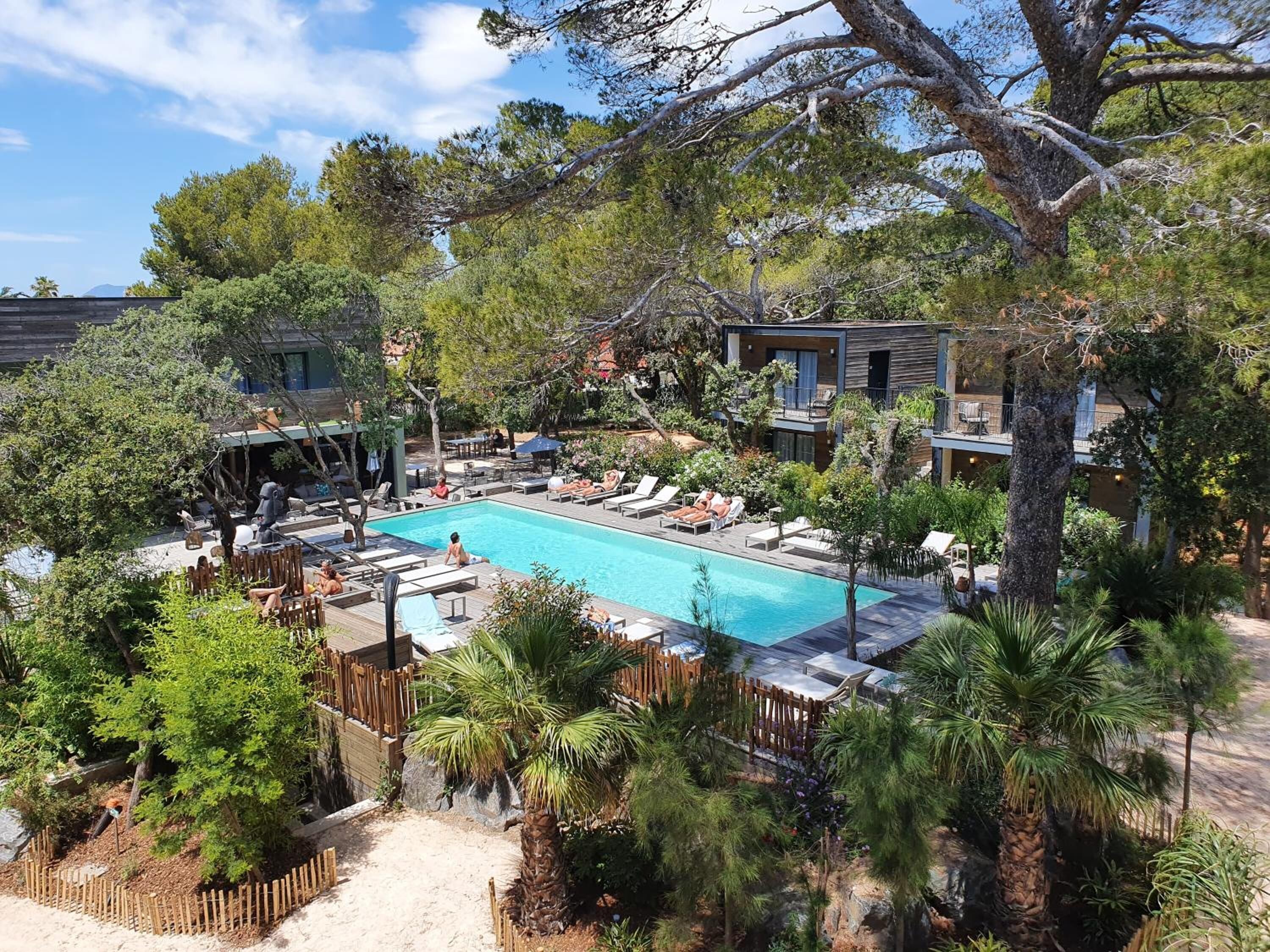 outdoor pool, open 8:00 am to 8:00 pm, pool umbrellas, pool loungers