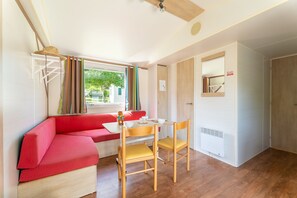 Koawa Loggia Classic | Living area - Camping le Caussanel (Canet-de-Salars)