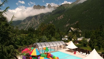 Seasonal outdoor pool, pool loungers