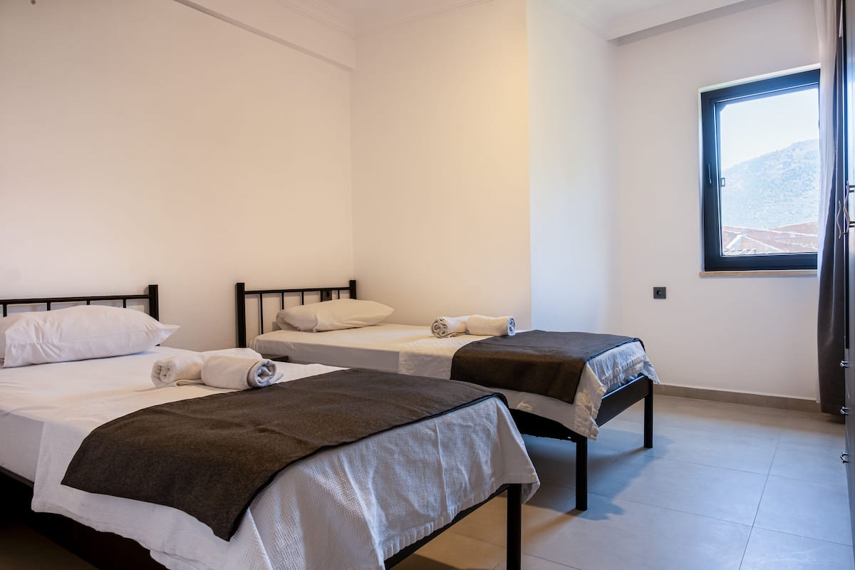 Family Twin Room | 1 bedroom, iron/ironing board, free WiFi, bed sheets