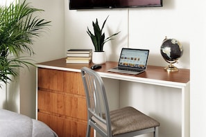 49-inch flat-screen TV with satellite channels, TV - InTown Suites Extended Stay Atlanta GA - Lilburn (Snellville)