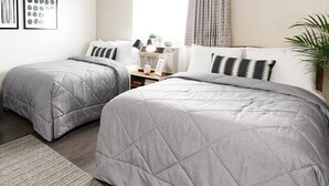 Chambre Prestige, 2 lits doubles | Accès au Wi-Fi (inclus), literie fournie