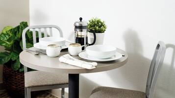 Upgrade 1 Queen Bed | Living area | 49-inch flat-screen TV with satellite channels, TV