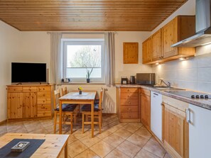 Appartement | Cuisine privée | Chaise haute