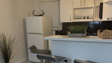 Microwave, coffee/tea maker, toaster, rice cooker