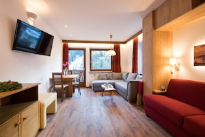 Appartement, 1 chambre, balcon | Salle de séjour | Téléviseur ACL