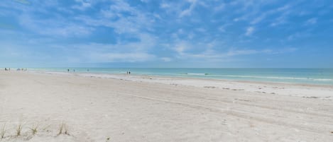 On the beach, sun loungers, beach towels