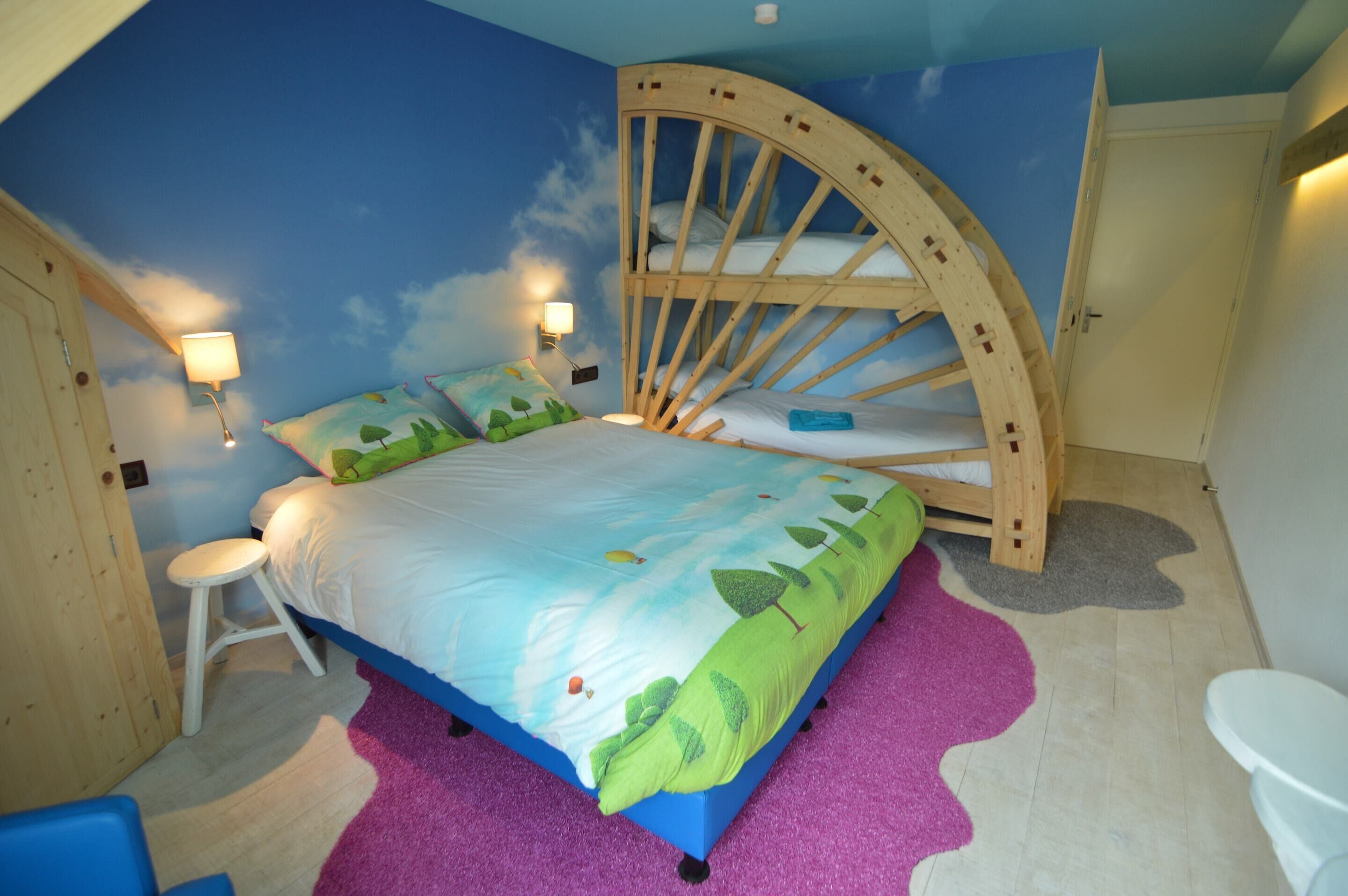 A bedroom with a curved wooden bed, a small stool, a purple rug, and a white toilet.