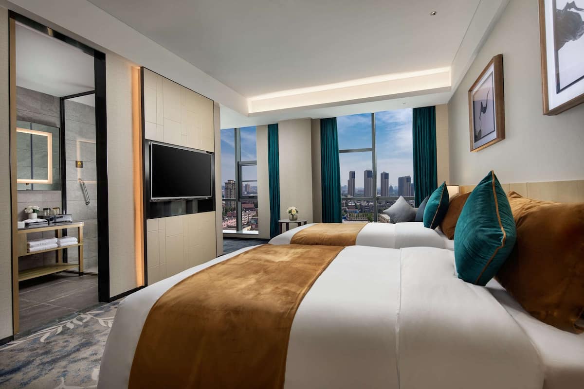 Minibar, coffres-forts dans les chambres, fer et planche à repasser