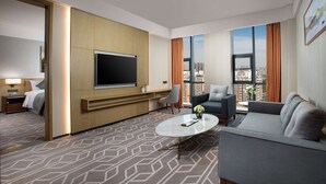 Suite ejecutiva, 1 cama de matrimonio grande, no fumadores | Minibar, caja fuerte, tabla de planchar con plancha y wifi gratis
